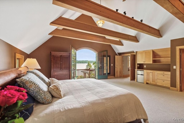 bedroom featuring lofted ceiling with beams, access to exterior, freestanding refrigerator, and light colored carpet