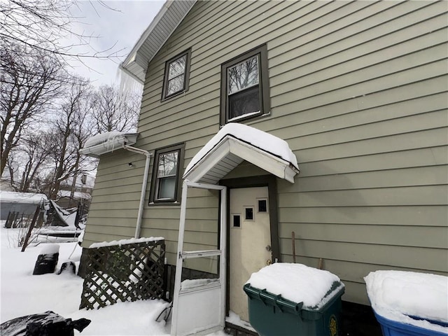 view of snow covered house