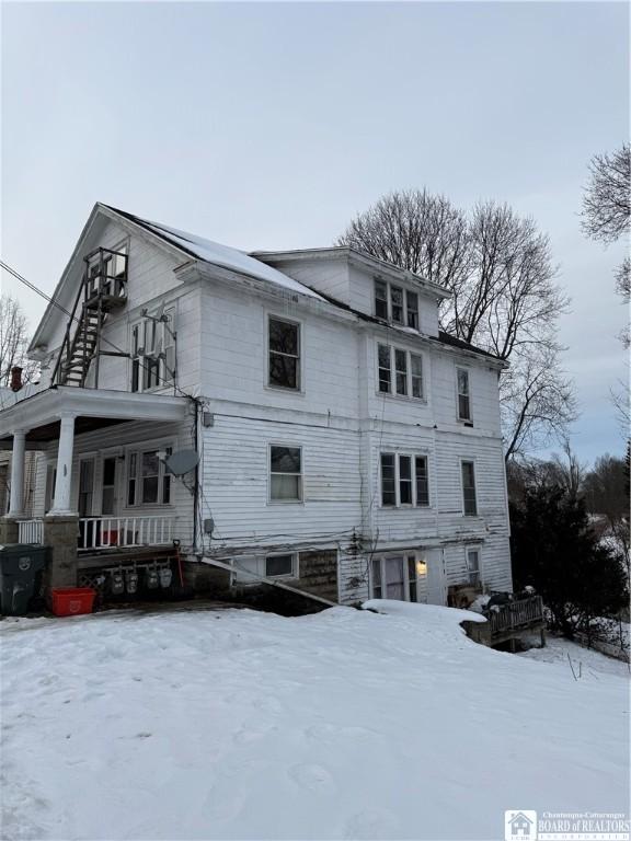 view of snow covered property