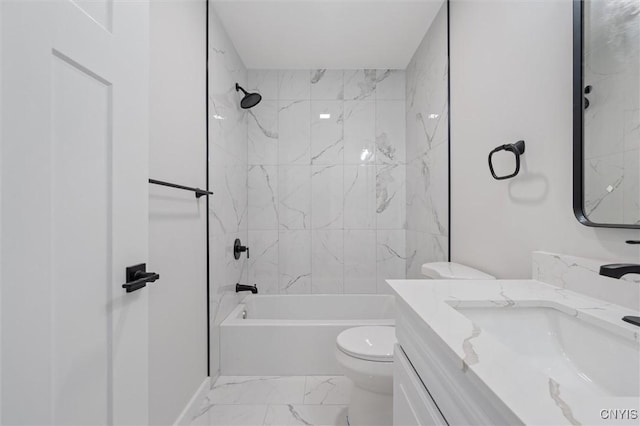 full bathroom with washtub / shower combination, marble finish floor, vanity, and toilet