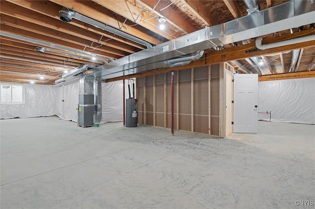 basement with heating unit and water heater