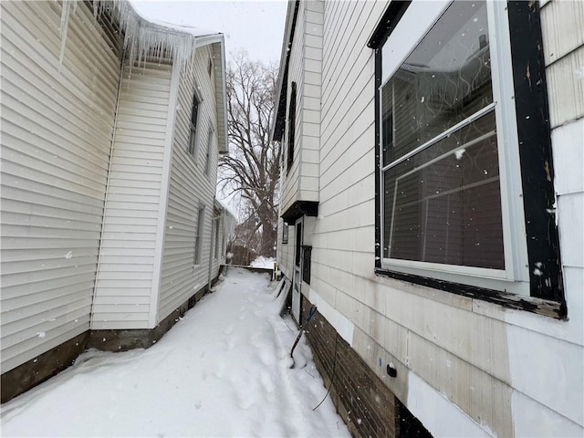 view of snow covered property