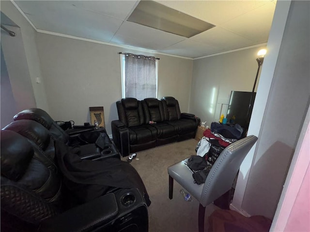 carpeted living area featuring crown molding