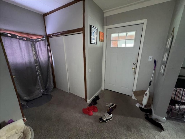 entrance foyer featuring carpet floors