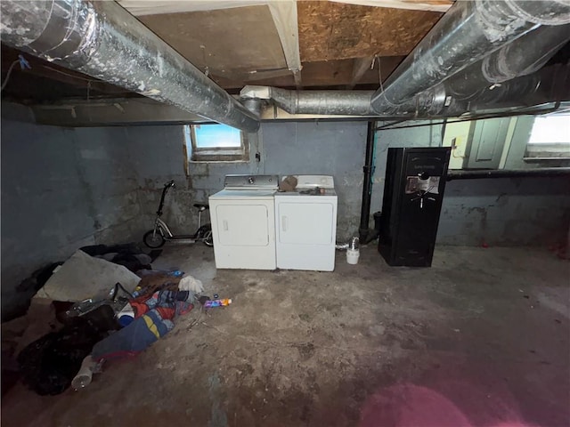 below grade area with washer and clothes dryer