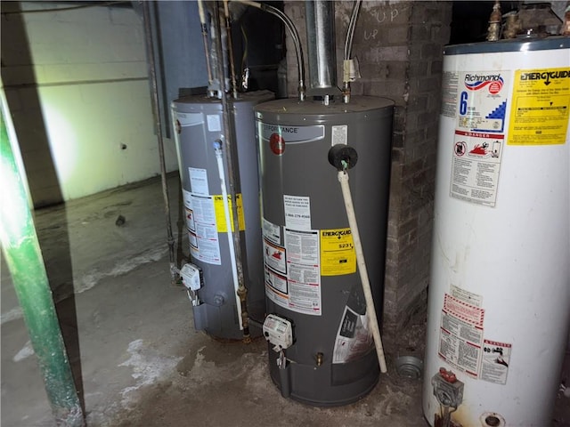 utility room featuring gas water heater