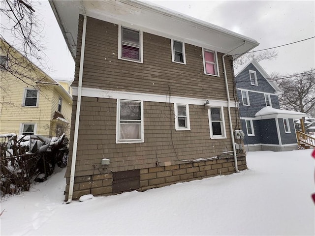 view of snow covered house