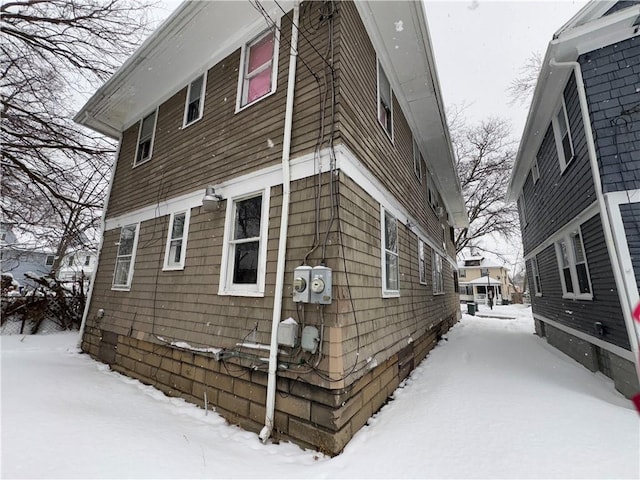 view of snow covered property