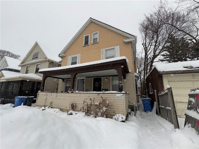 view of snow covered house