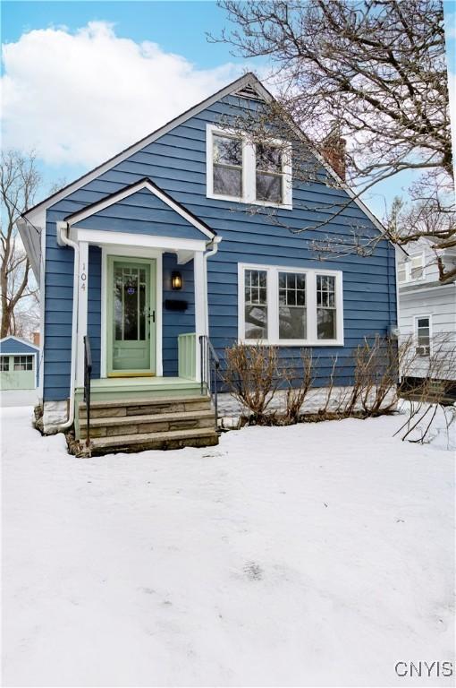 view of front of property featuring a chimney