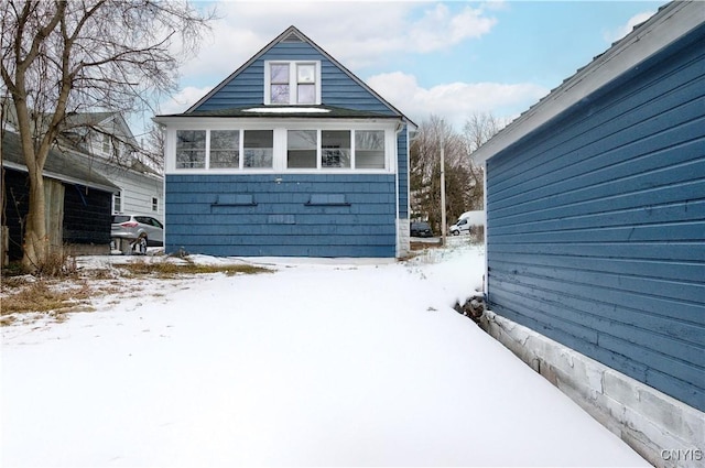 view of snow covered property