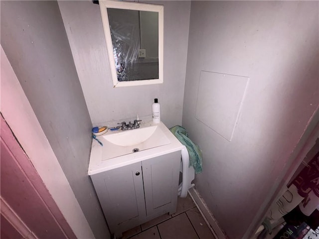 bathroom with vanity and tile patterned floors