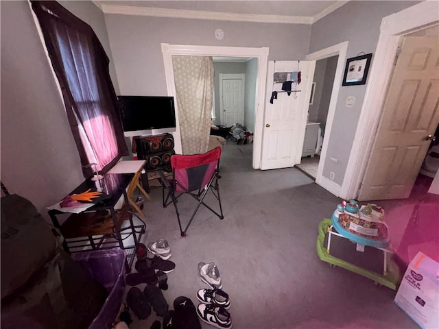 interior space featuring baseboards and crown molding