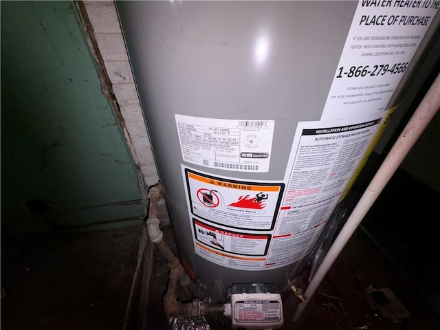 utility room with water heater