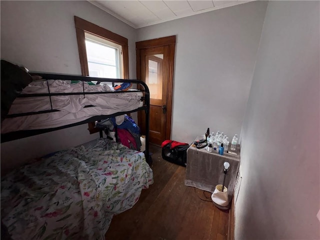 bedroom with hardwood / wood-style floors