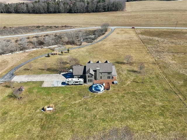 birds eye view of property featuring a rural view