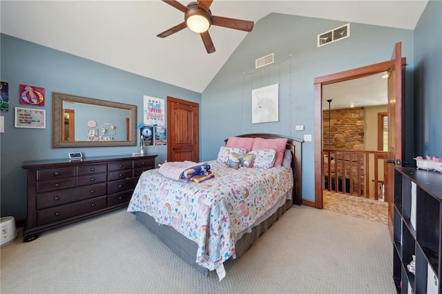 bedroom with carpet floors, high vaulted ceiling, ceiling fan, and visible vents