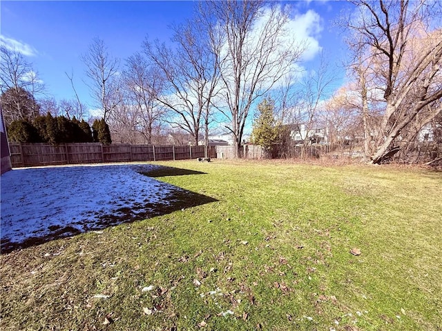 view of yard featuring a fenced backyard