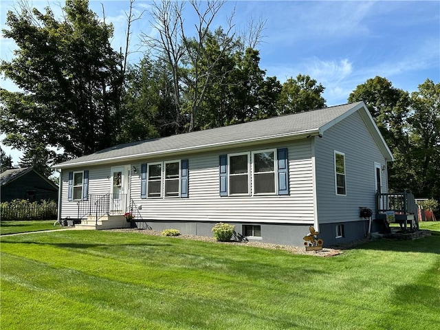 ranch-style home with a front yard