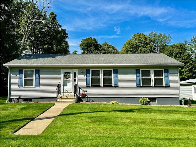 view of front of house with a front yard and entry steps