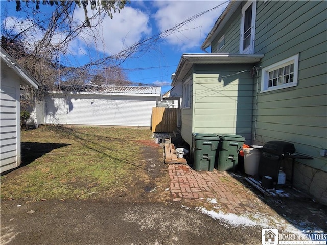 view of yard featuring a patio area and fence