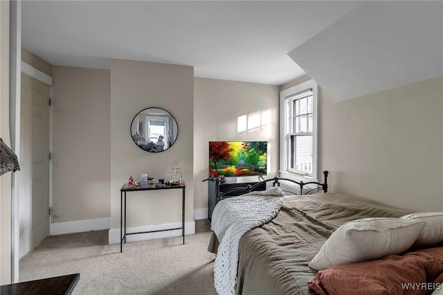 carpeted bedroom with baseboards