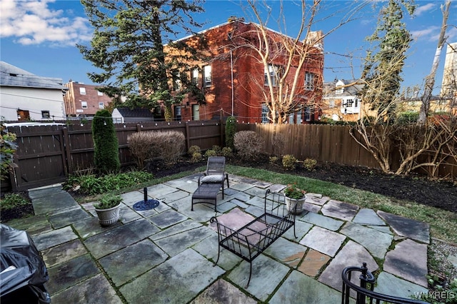 view of patio with a fenced backyard