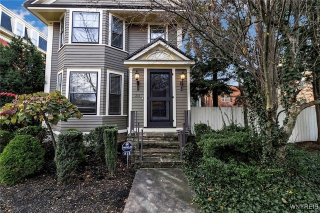 view of front of house with fence