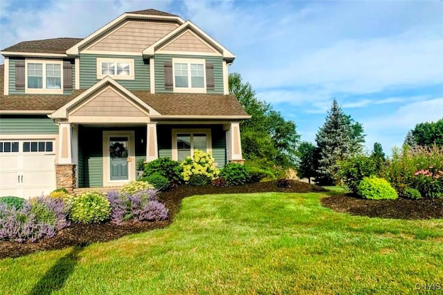 craftsman-style house with a shingled roof and a front lawn