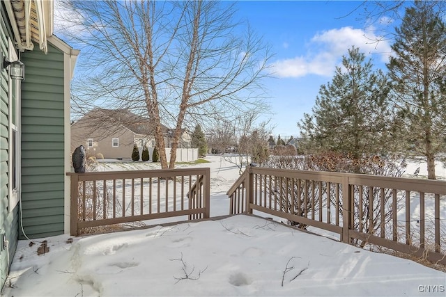 view of snow covered deck