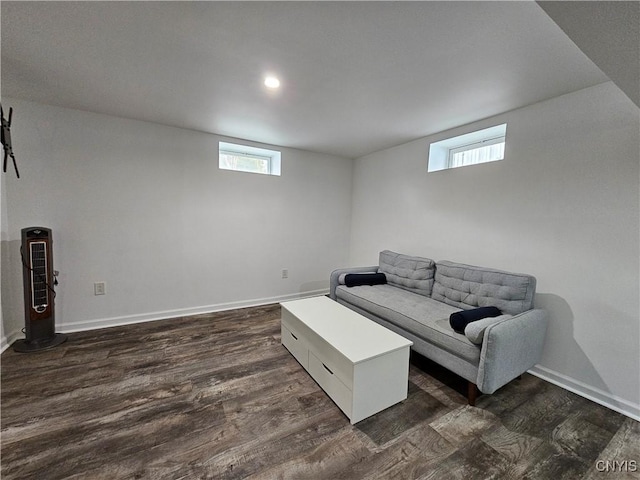 living room with baseboards, dark wood-type flooring, and recessed lighting