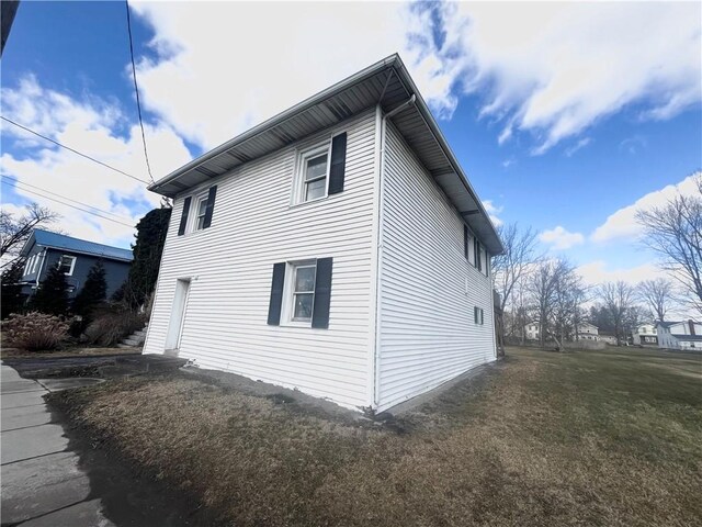 231 E Main St, Waterloo, NY 13165 - view of home's exterior with a yard