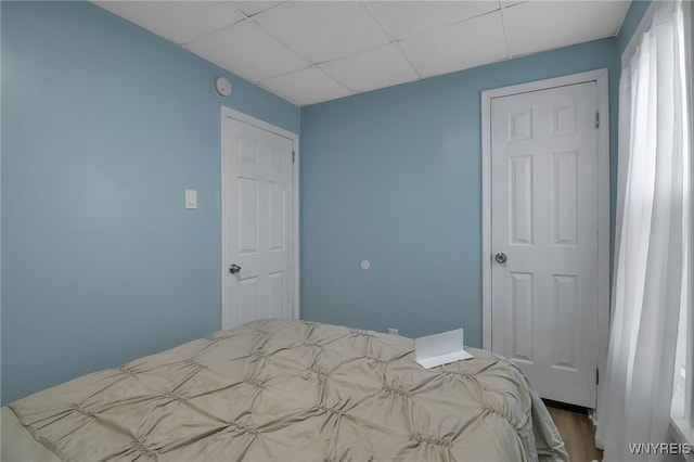 bedroom with a paneled ceiling