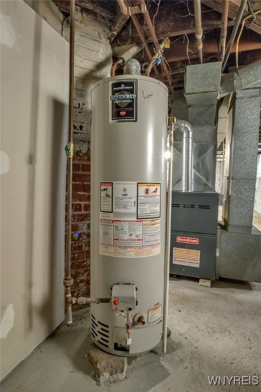 utility room with gas water heater and heating unit