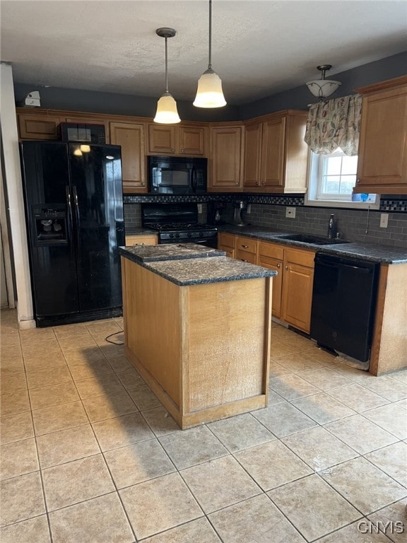 kitchen with black appliances, a kitchen island, light tile patterned flooring, and backsplash