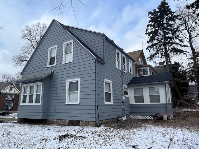 view of snow covered property