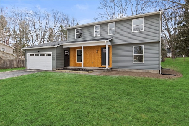 view of front of house featuring driveway, a front lawn, fence, covered porch, and a garage