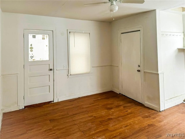 entryway with a ceiling fan and wood finished floors