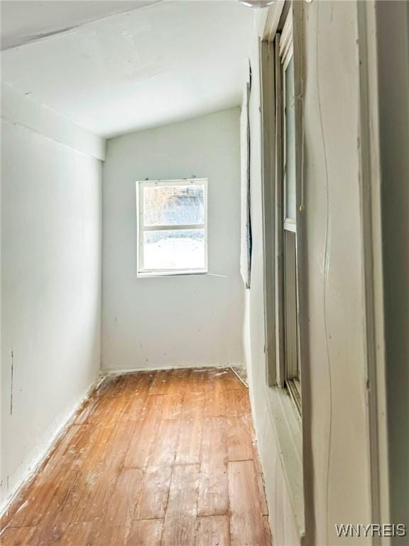 unfurnished room with light wood-type flooring