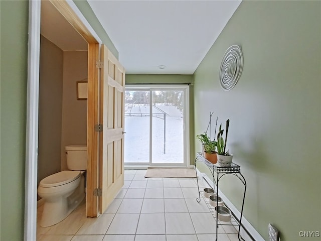 entryway featuring light tile patterned floors