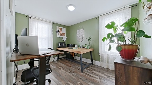 office with baseboards and wood finished floors