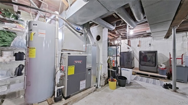 utility room featuring washer / clothes dryer and gas water heater