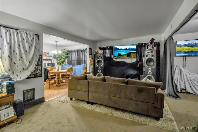 living area with an inviting chandelier