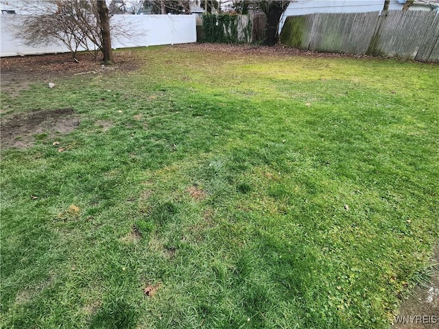 view of yard with fence