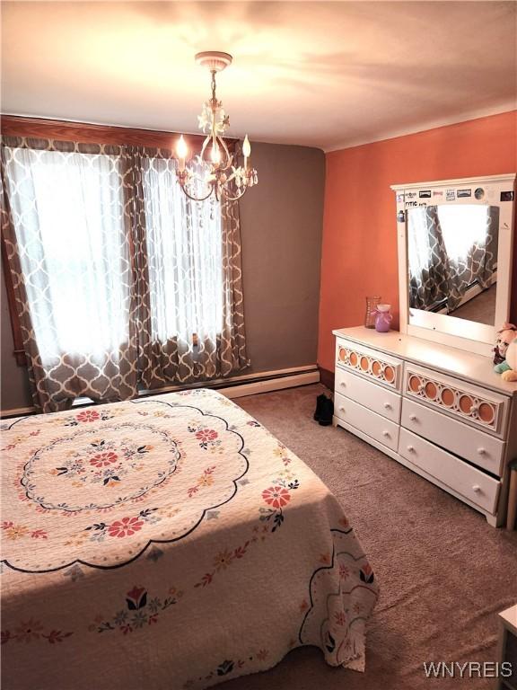 unfurnished bedroom featuring carpet floors and a notable chandelier