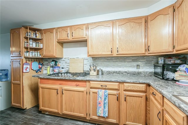 kitchen with open shelves, stainless steel gas stovetop, decorative backsplash, light brown cabinets, and light stone countertops