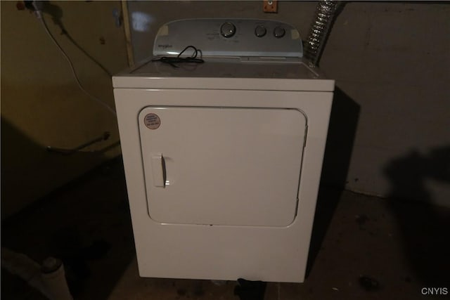 clothes washing area featuring laundry area and washer / clothes dryer