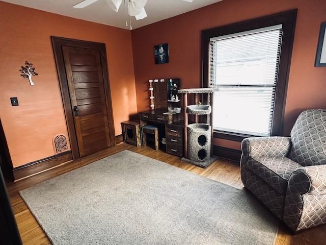 office with ceiling fan and wood finished floors