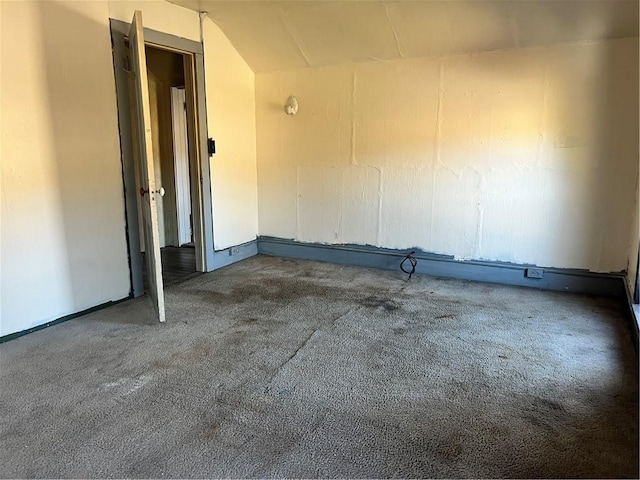 empty room featuring carpet flooring