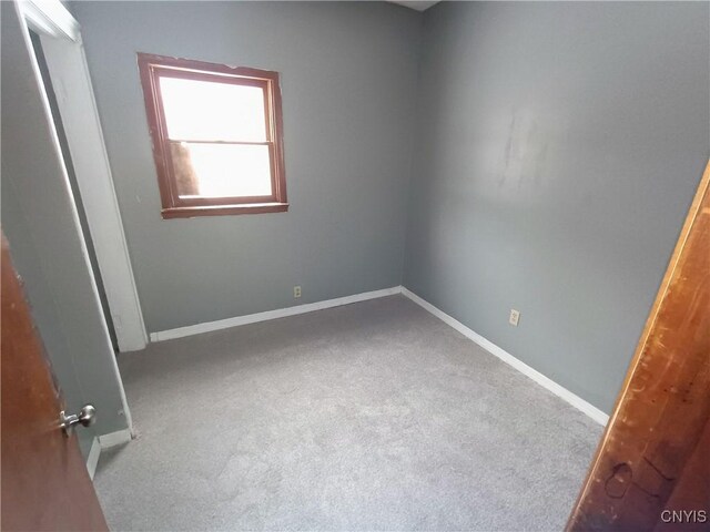 812 Kirkpatrick St, Syracuse, NY 13208 - unfurnished bedroom with baseboards and carpet